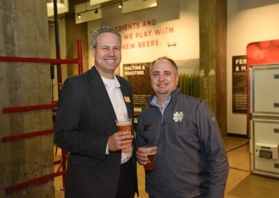 two-men-holding-beer